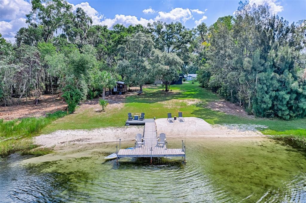 113 Stock Avenue Interlachen, FL 32148 - Photo 4 of 62 a view of a swimming pool with a yard