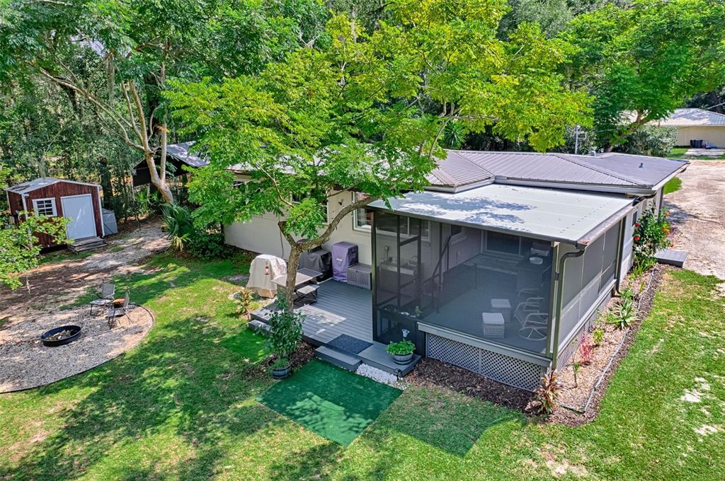 113 Stock Avenue Interlachen, FL 32148 - Photo 48 of 62 an aerial view of a house with a yard