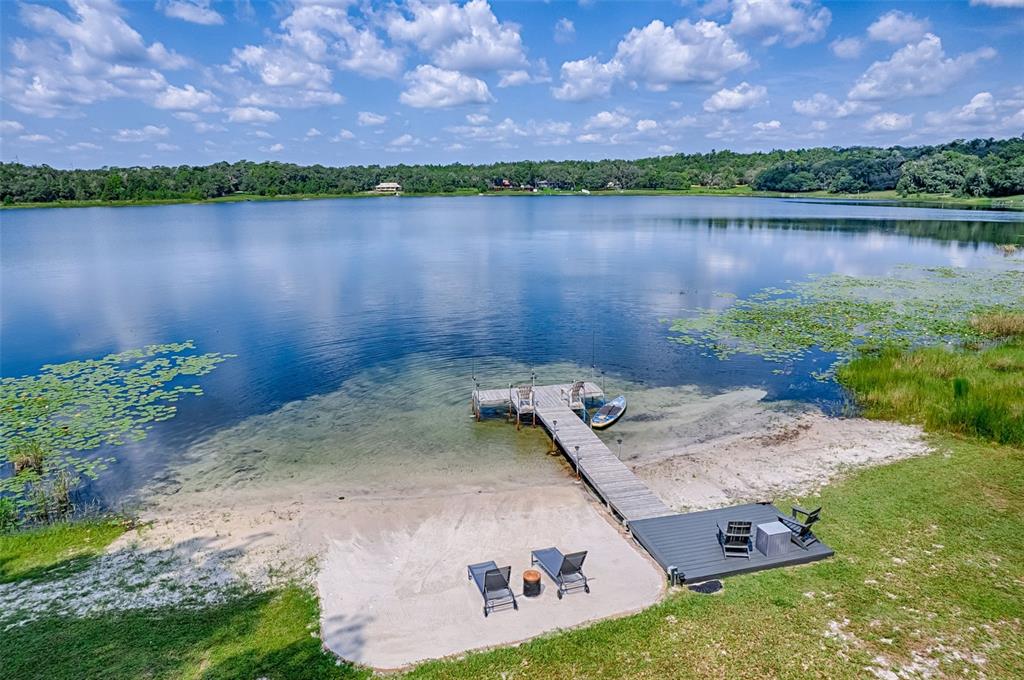 113 Stock Avenue Interlachen, FL 32148 - Photo 51 of 62 a view of a lake in middle of the forest