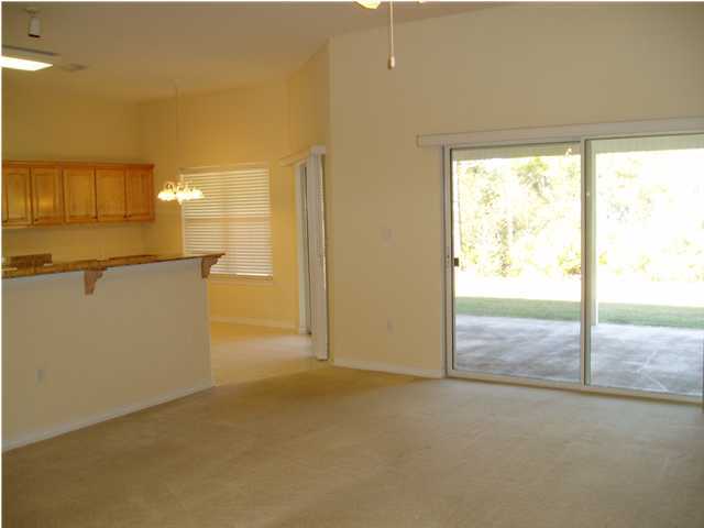 6894 Fernandina Road Navarre, FL 32566 - Photo 8 of 17 a view of a room with a view of the house