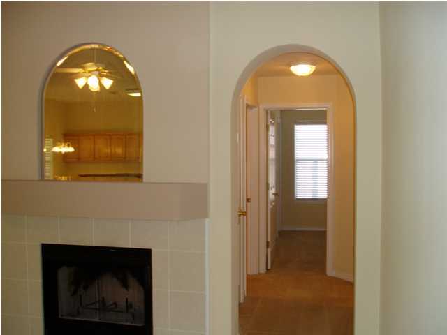 6894 Fernandina Road Navarre, FL 32566 - Photo 10 of 17 a view of a livingroom with a fireplace