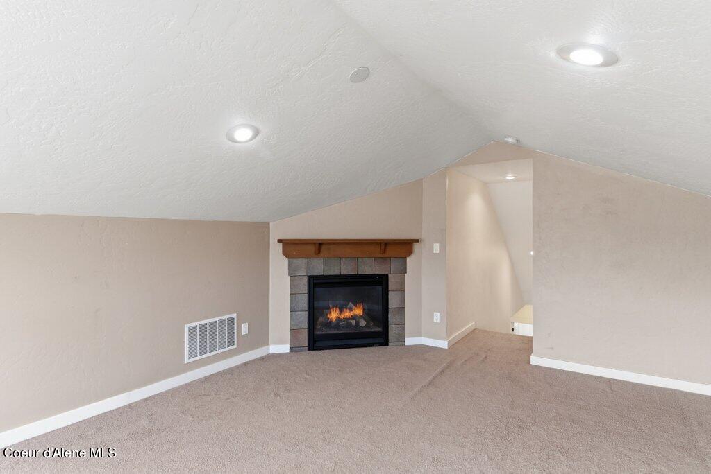 80 Carlson Drive Sandpoint, ID 83864 - Photo 30 of 50 Gas Fireplace in Bonus Room