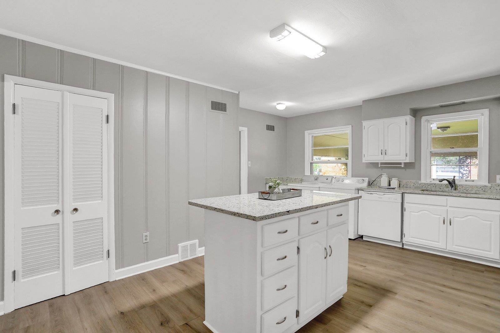 4892 Amboy Road Memphis, TN 38117 - Photo 10 of 26 a kitchen with white cabinets and sink
