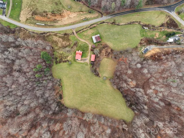 a view of a yard with an outdoor space