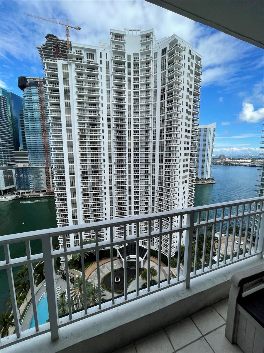 Brickell Miami, FL 33131 - Photo 27 of 50 a view of balcony with a couple of cars parked in parking lot