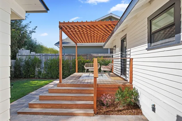 a view of a cafe with a table and chairs