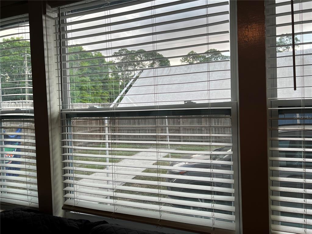 408 Northeast 18th Street Gainesville, FL 32641 - Photo 6 of 8 a view of a balcony from a window