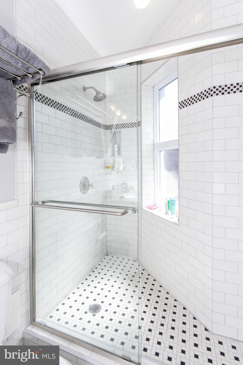 1423 R Street Northwest, Unit 505 Washington, DC 20009 - Photo 16 of 22 a bathroom with a shower and a toilet