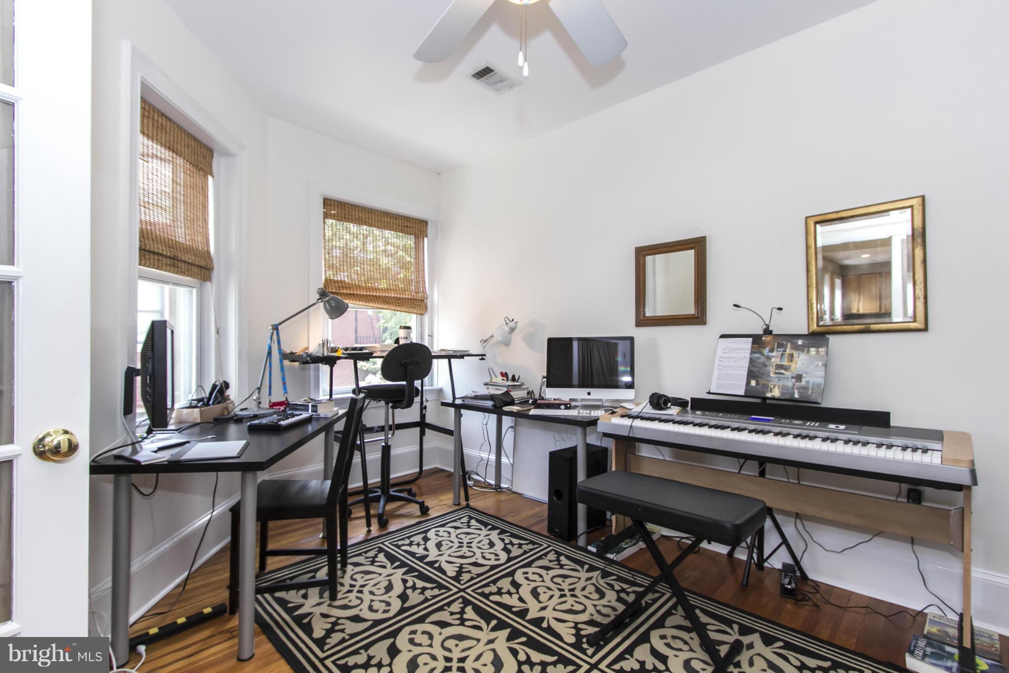 1423 R Street Northwest, Unit 505 Washington, DC 20009 - Photo 17 of 22 a view of a workspace with furniture