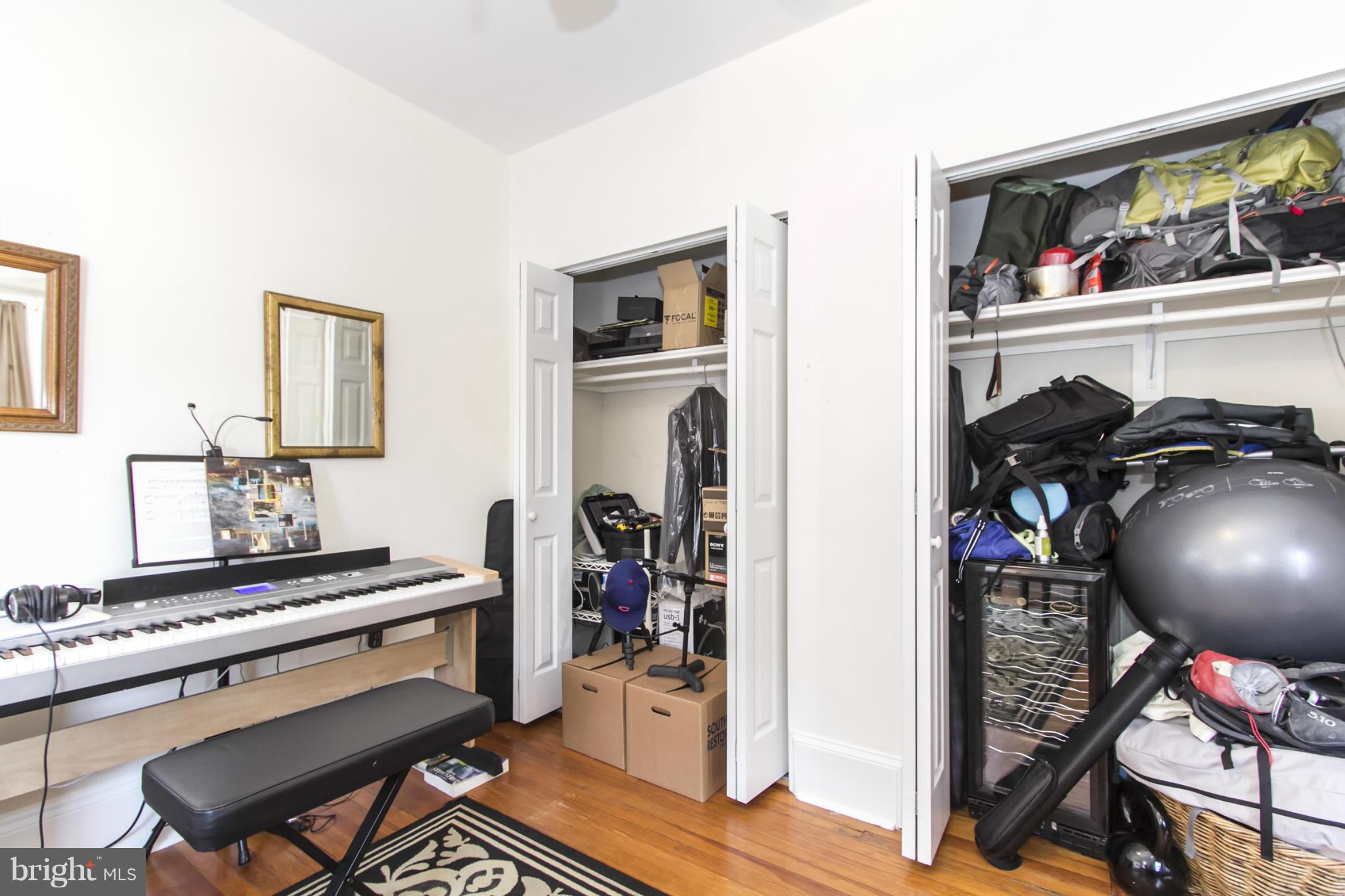 1423 R Street Northwest, Unit 505 Washington, DC 20009 - Photo 18 of 22 a view of a workspace with furniture and closet