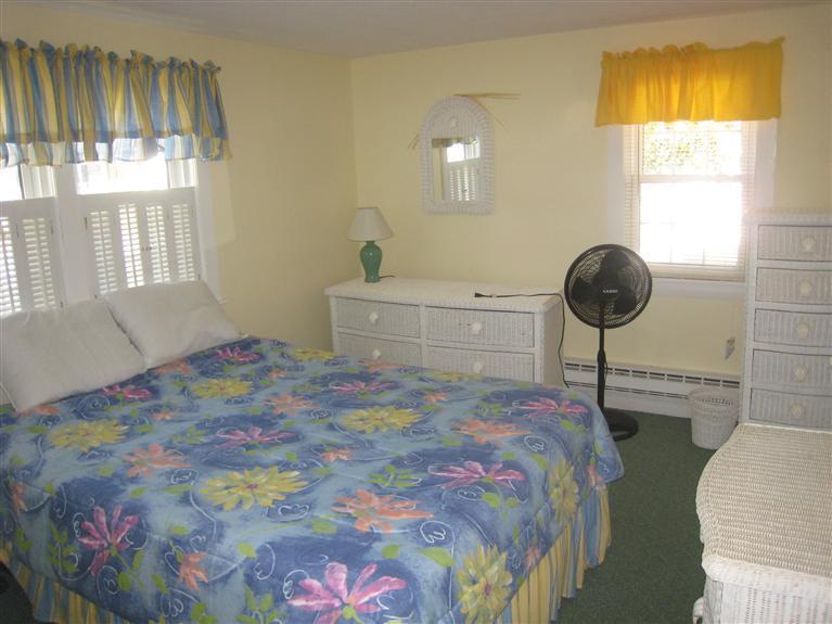 70 Captain Chase Road Dennis Port, MA 02639 - Photo 5 of 10 a bedroom with a bed and a window