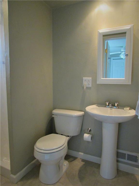 294 Idlewood Road Penn Hills, PA 15235 - Photo 13 of 25 Main floor full bath located off 4th bedroom, has stand up shower and linen closet