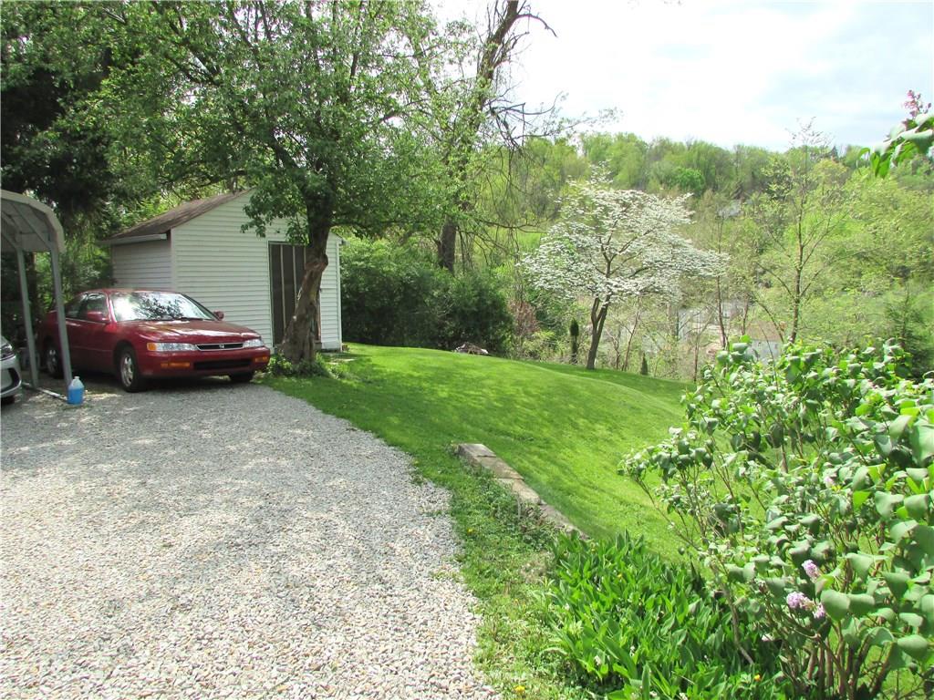 294 Idlewood Road Penn Hills, PA 15235 - Photo 25 of 25 Double carport to store cars and the shed transfer with the sale of the home. Plenty of off street parking