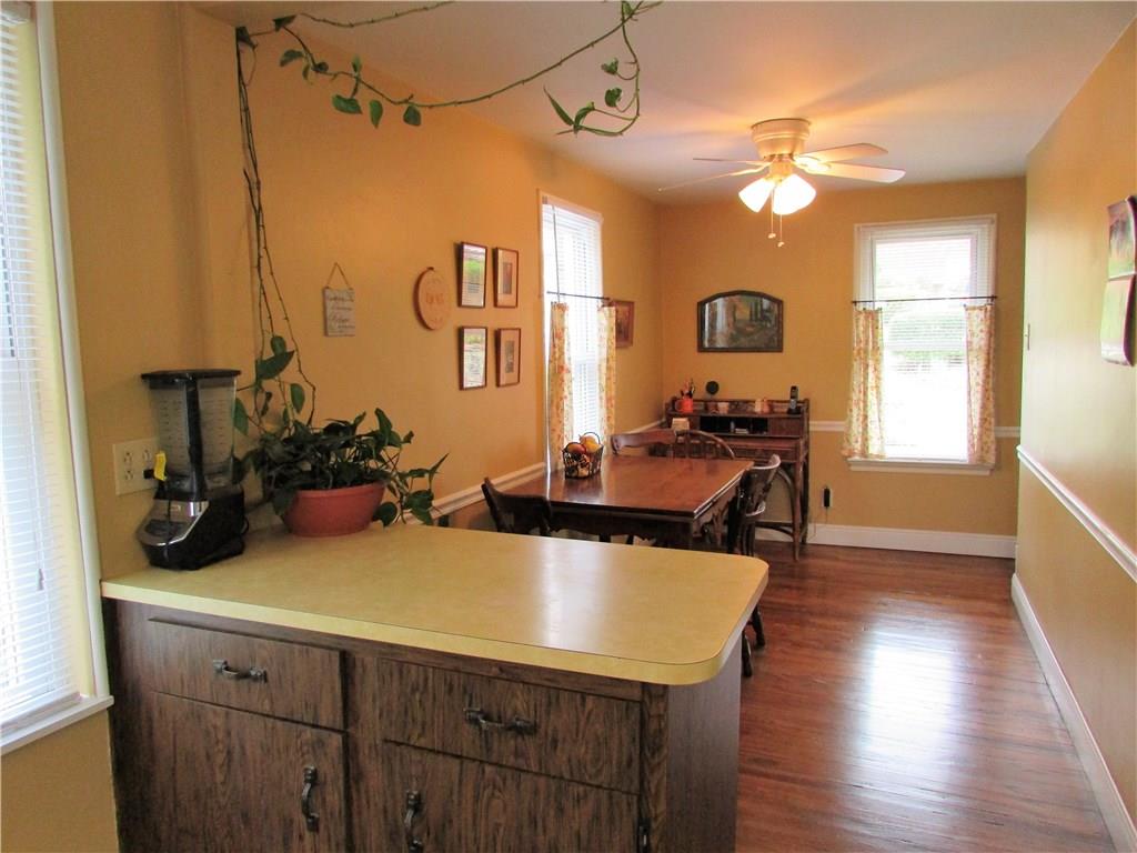 294 Idlewood Road Penn Hills, PA 15235 - Photo 8 of 25 Small kitchen island that can aid you when cooking or baking. Plants just love the natural light in this home!!