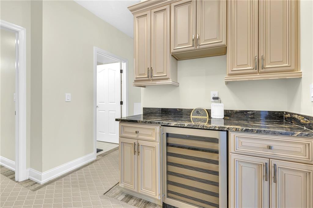 216 Adams Pointe Boulevard, Unit 8 Mars, PA 16046 - Photo 13 of 34 a kitchen with stainless steel appliances granite countertop a stove a sink and white cabinets
