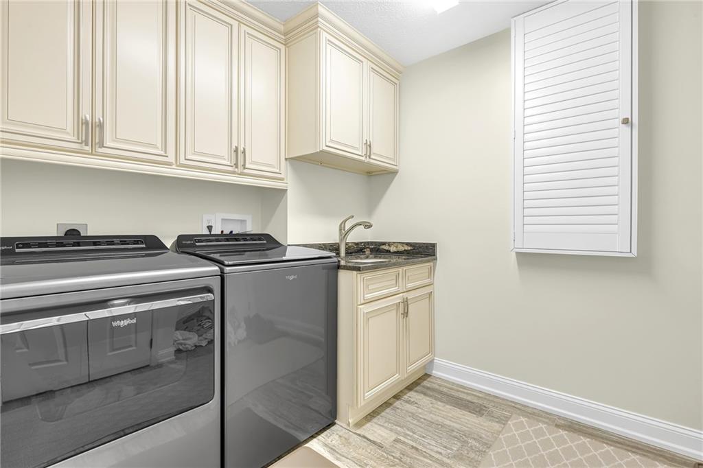 216 Adams Pointe Boulevard, Unit 8 Mars, PA 16046 - Photo 23 of 34 a kitchen with stainless steel appliances granite countertop a refrigerator and a stove