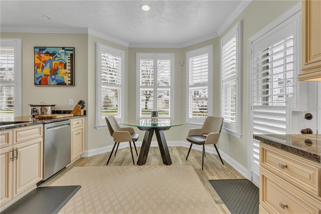 216 Adams Pointe Boulevard, Unit 8 Mars, PA 16046 - Photo 10 of 33 Dining area w bump-out window