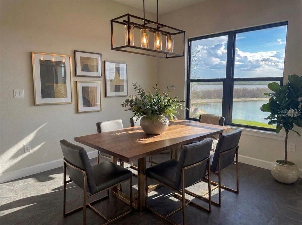 224 Valencia Ridge Drive Auburndale, FL 33823 - Photo 13 of 39 a dining room with furniture and window