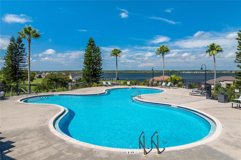 224 Valencia Ridge Drive Auburndale, FL 33823 - Photo 30 of 39 a view of a swimming pool with a patio