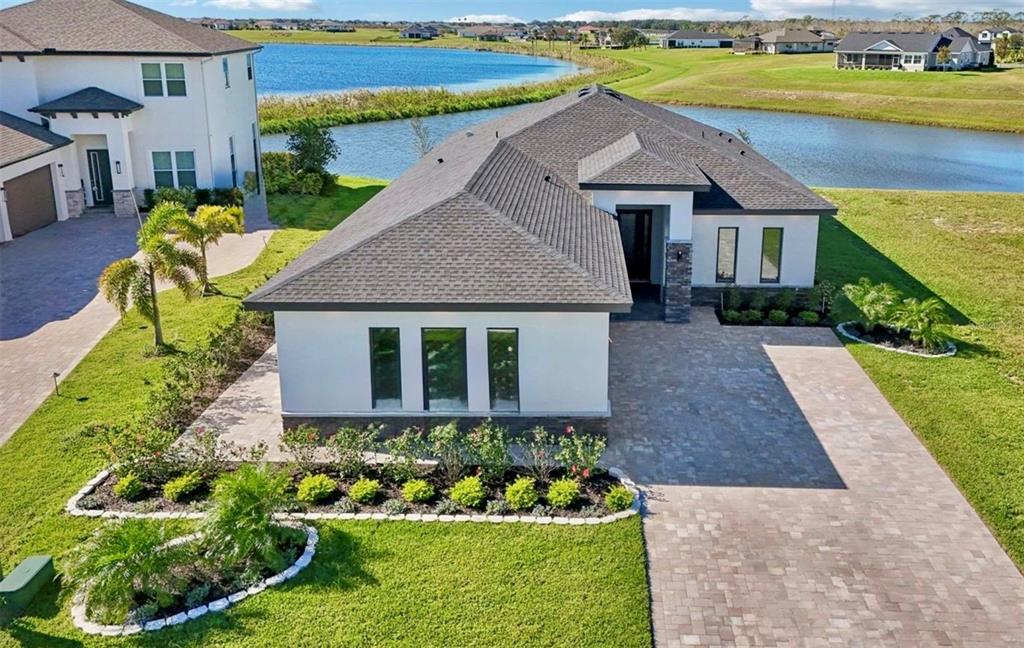 224 Valencia Ridge Drive Auburndale, FL 33823 - Photo 5 of 39 a front view of house with yard and green space