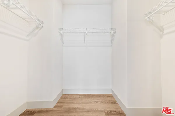 a view of small space with racks on the wall