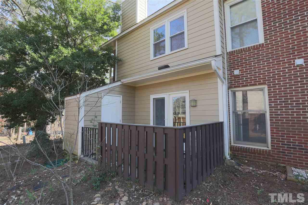 3533 Mill Run, Unit N/A Raleigh, NC 27612 - Photo 18 of 19 a front view of a house with balcony