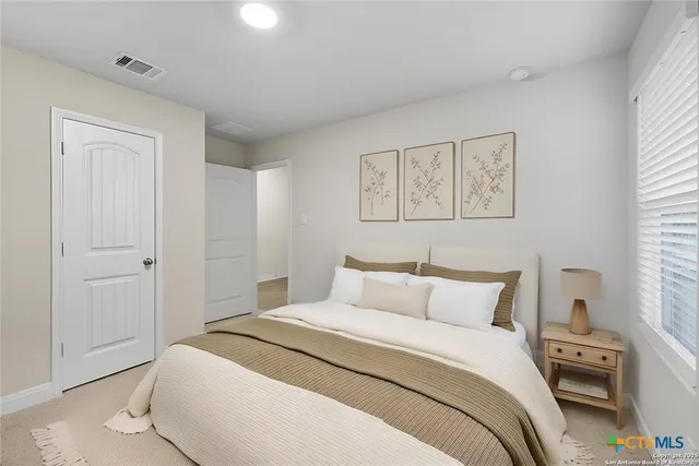 a bathroom with a shower and a toilet