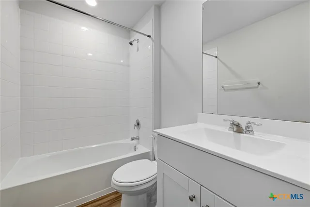 a view of storage and utility room with racks on the wall