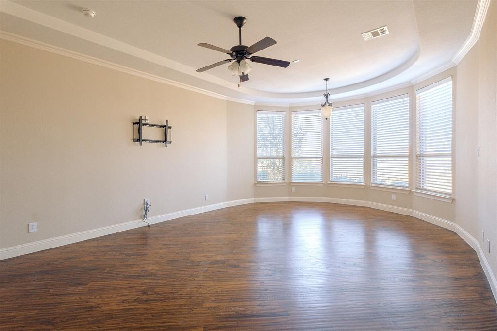 2207 Galloway Boulevard Trophy Club, TX 76262 - Photo 14 of 36 wooden floor in an empty room with a window