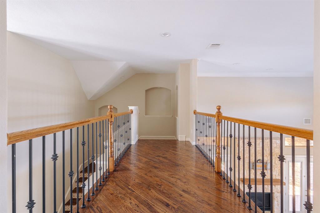 2207 Galloway Boulevard Trophy Club, TX 76262 - Photo 23 of 36 a view of a hallway with wooden floor