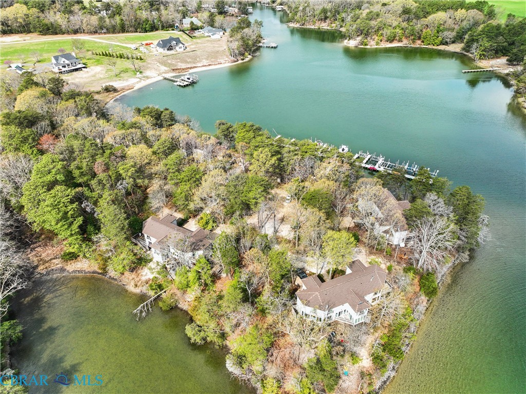 172 Sturgeon Creek Road Deltaville, VA 23043 - Photo 43 of 50 Bird's eye view of a large body of water and a tree filled landscape