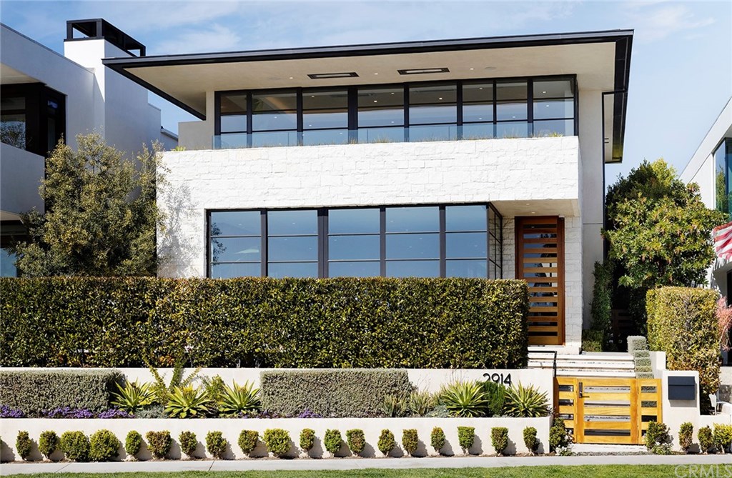 2914 Ocean Boulevard Corona del Mar, CA 92625 - Photo 2 of 60 a view of a house with a small yard