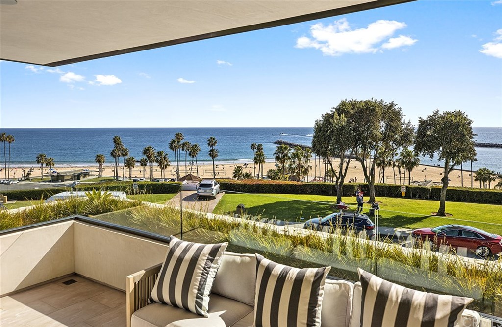 2914 Ocean Boulevard Corona del Mar, CA 92625 - Photo 38 of 60 a view of a swimming pool with a lounge chairs