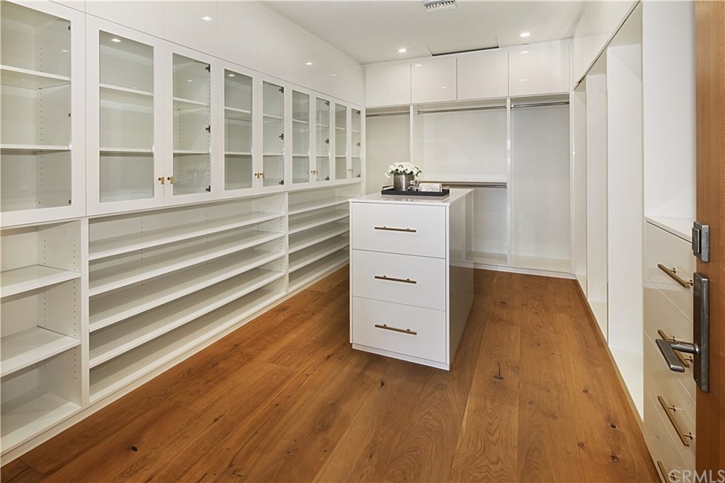 2914 Ocean Boulevard Corona del Mar, CA 92625 - Photo 45 of 60 a view of walk in closet with empty racks