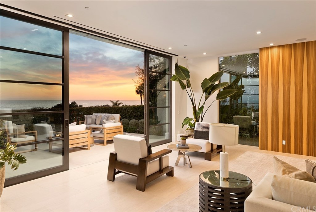2914 Ocean Boulevard Corona del Mar, CA 92625 - Photo 6 of 60 a living room with furniture and a large window