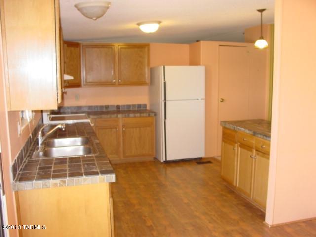 5201 North Lak A Yucca Road Tucson, AZ 85743 - Photo 2 of 19 a view of a kitchen with a sink