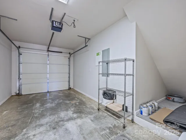 a view of a room with storage and utility room