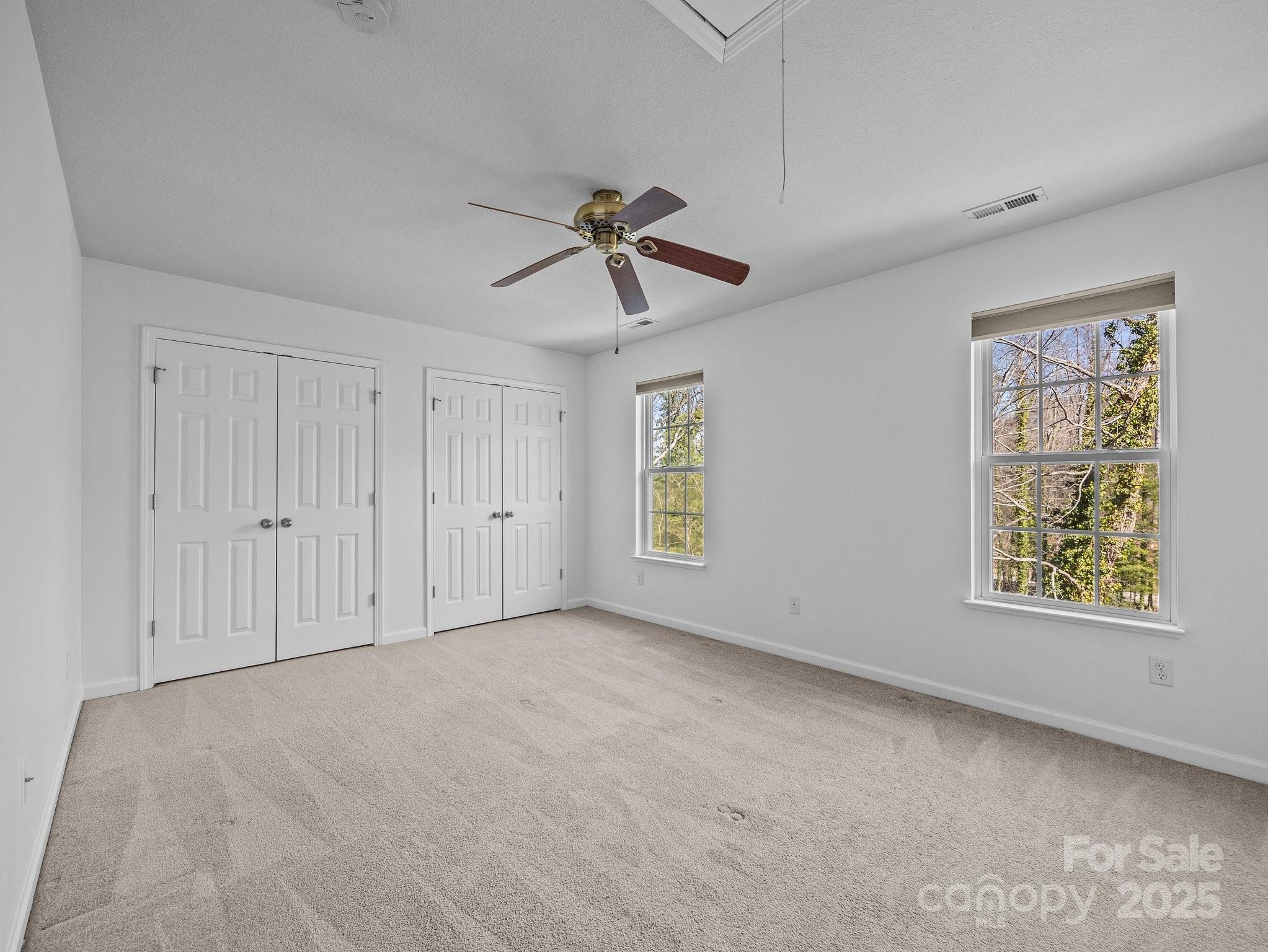 107 Alpine Ridge Drive Asheville, NC 28803 - Photo 13 of 29 a view of an empty room with a window