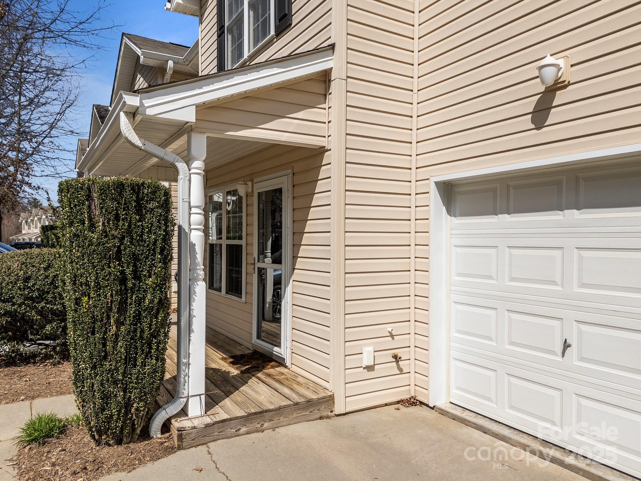 107 Alpine Ridge Drive Asheville, NC 28803 - Photo 26 of 29 a view of a small house with backyard space and porch