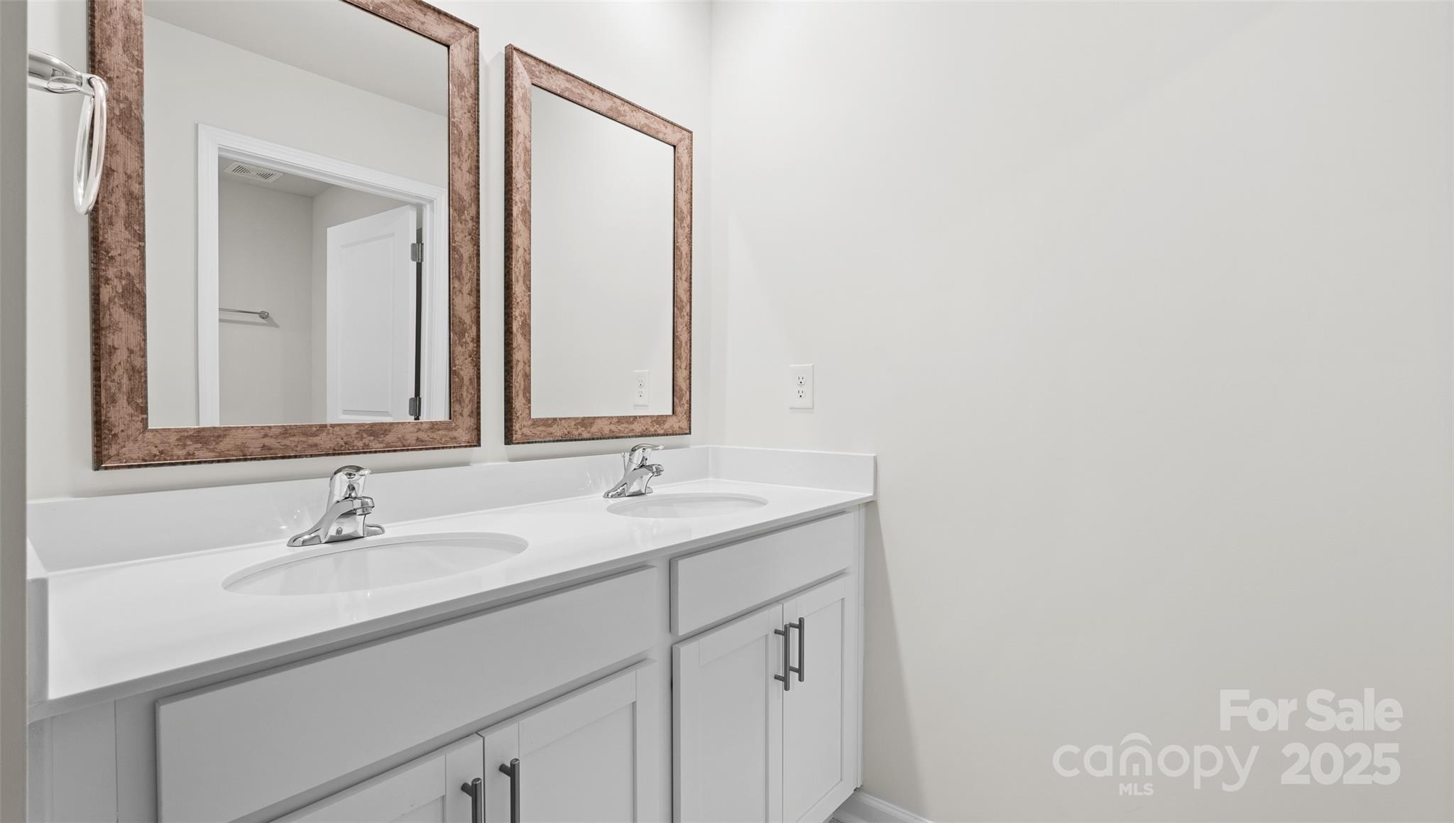 220 Salers Road Fletcher, NC 28732 - Photo 16 of 25 a bathroom with a sink and a mirror