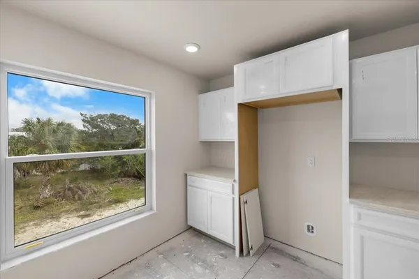 a view of a room with an empty space