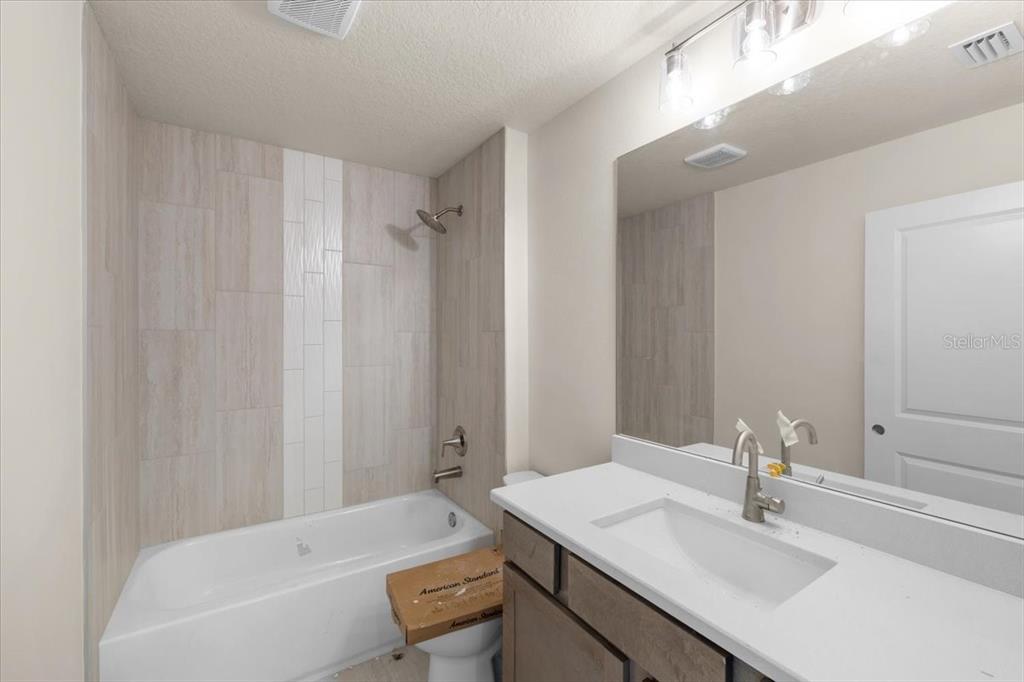 3498 Centavo Court Hernando Beach, FL 34607 - Photo 25 of 44 a bathroom with a sink and a mirror
