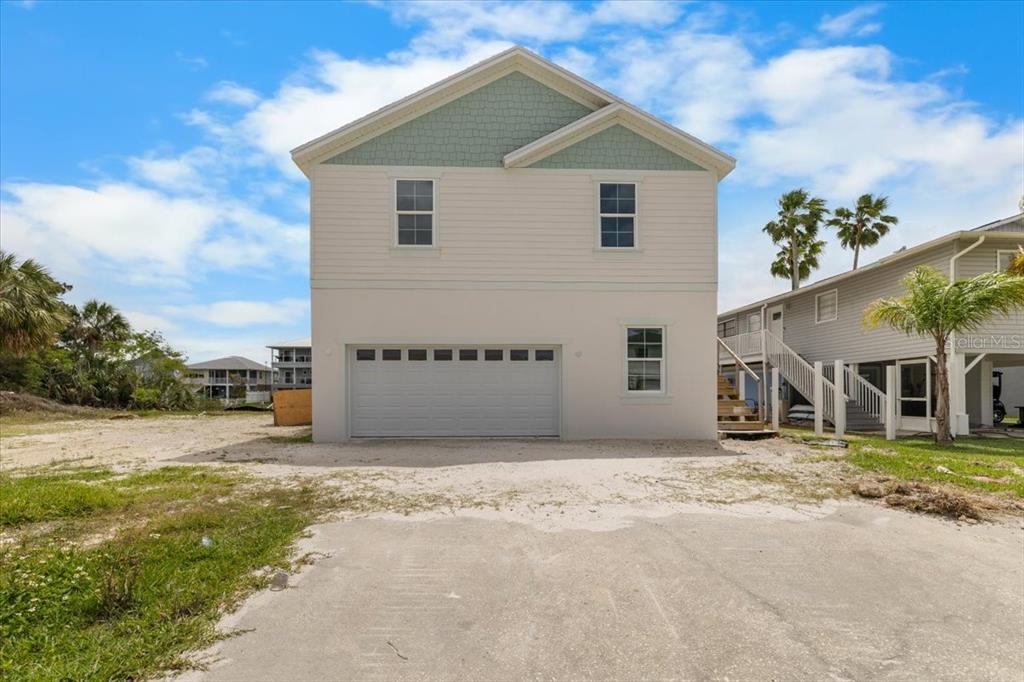 3498 Centavo Court Hernando Beach, FL 34607 - Photo 3 of 44 a view of a house with a outdoor space