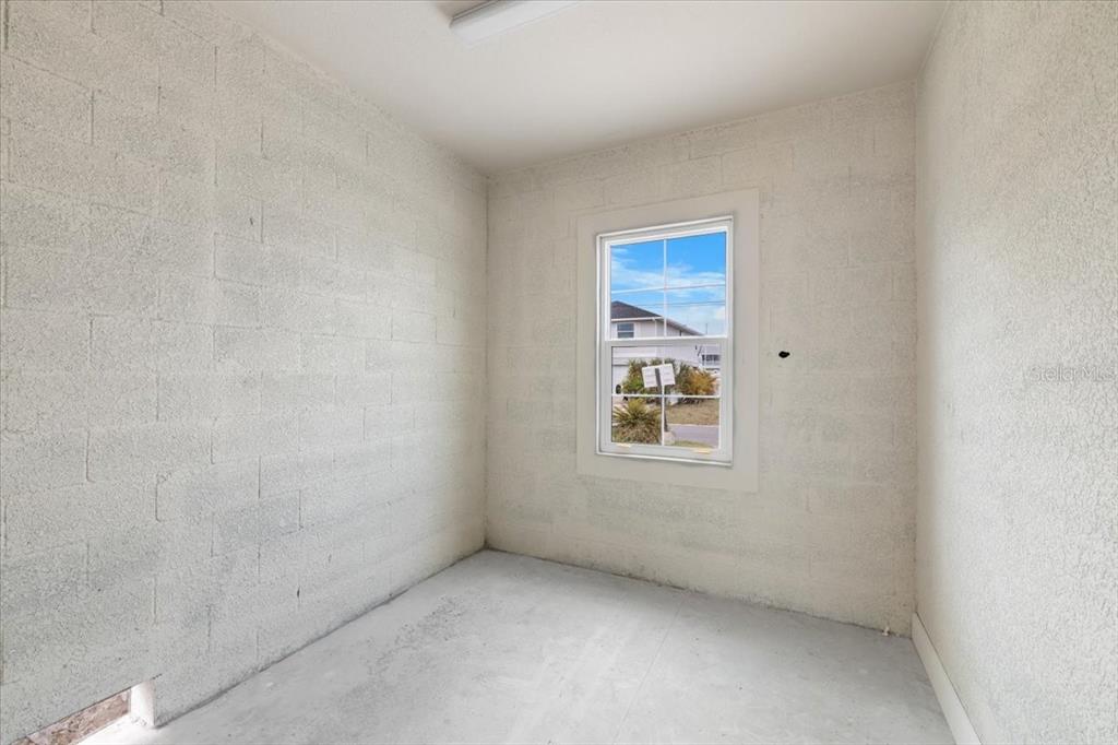 3498 Centavo Court Hernando Beach, FL 34607 - Photo 34 of 44 a view of an empty room with a window