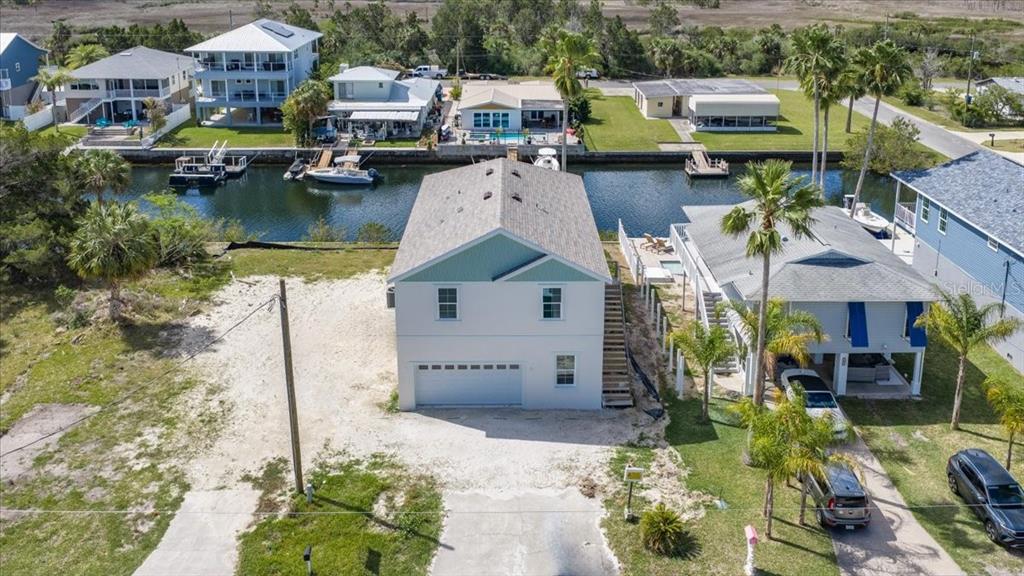 3498 Centavo Court Hernando Beach, FL 34607 - Photo 37 of 44 an aerial view of a house with outdoor space