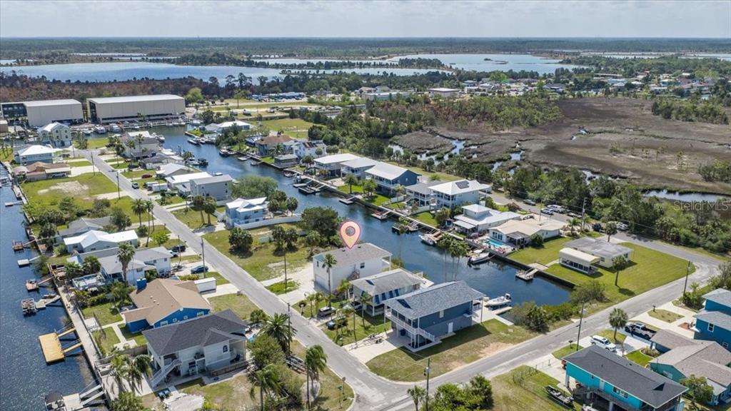 3498 Centavo Court Hernando Beach, FL 34607 - Photo 44 of 44 an aerial view of residential houses with outdoor space