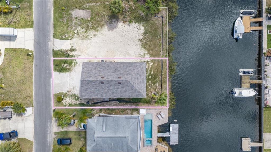 3498 Centavo Court Hernando Beach, FL 34607 - Photo 6 of 44 an aerial view of a house with a yard