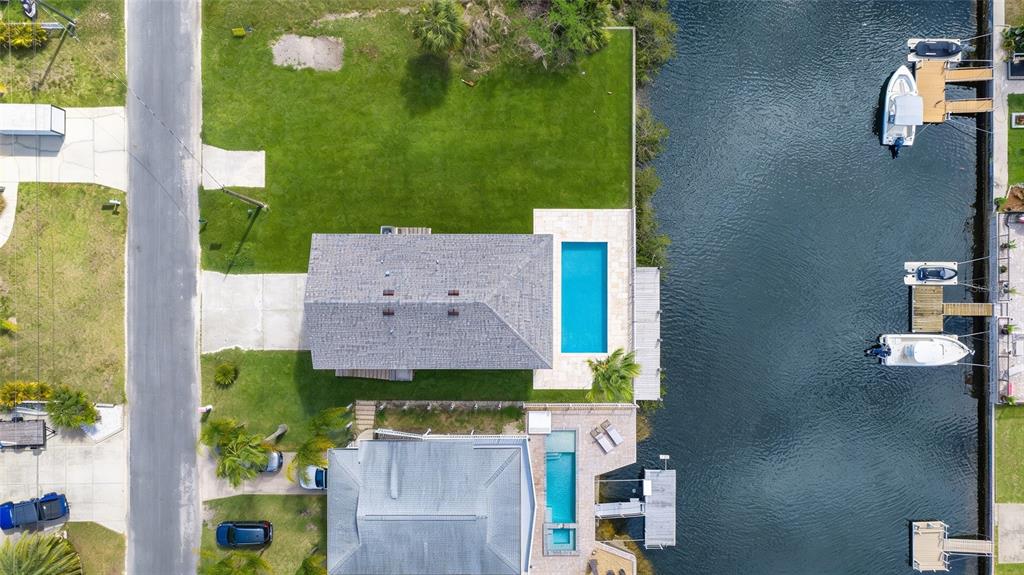 3498 Centavo Court Hernando Beach, FL 34607 - Photo 7 of 44 an aerial view of a house with a garden