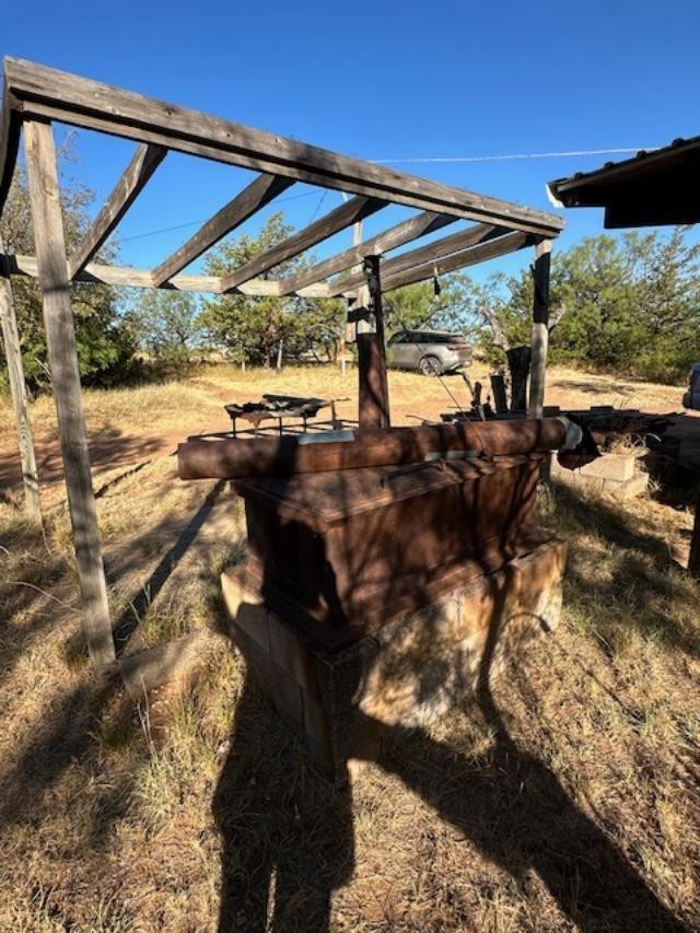 9 Mesquite Loop Roaring Springs, TX 79256 - Photo 15 of 22 a view of swimming pool with a patio