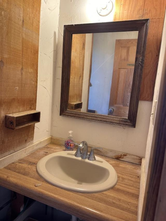 9 Mesquite Loop Roaring Springs, TX 79256 - Photo 9 of 22 a bathroom with a sink and a mirror
